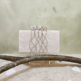 Three Stone Criss Cross Clutch